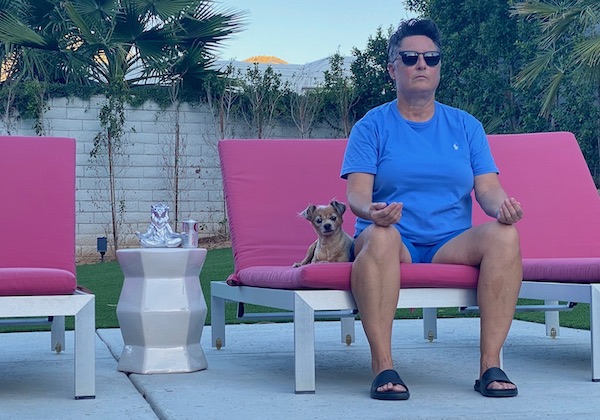 Shannon Miller, meditating alongside her rescue pup, Prince, in Palm Springs, California.